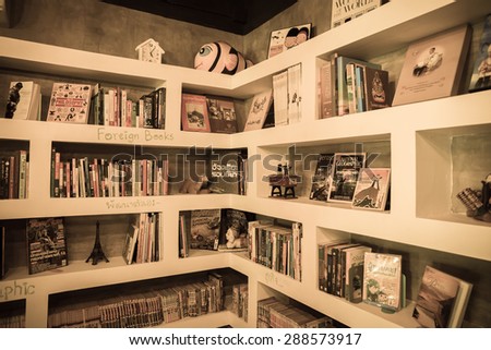 PATTAYA, THAILAND - JUNE 17 : The vintage tone of magazine corner in small coffee shop on June 17, 2015 in Pattaya, Thailand. Pattaya city is popular with attraction primarily for entertainment.