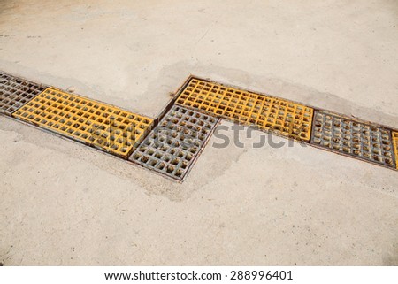 The long iron sieve on cement road