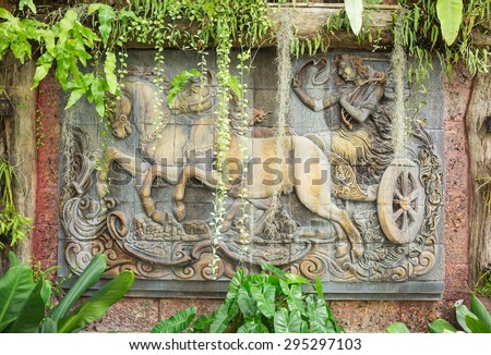 PHUKET, THAILAND - JULY 10 : The brass sculpture art wall about Thai novel in Tropical Garden Resort  Phuket  on July 10, 2015 in Phuket, Thailand.