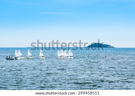 CHONBURI,THAILAND - JULY 24 : The group of student are training sailing in the sea at Sattaheep bay in Chonburi province,Thailand on July 24,2015.