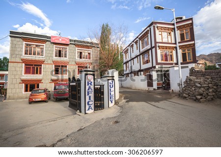 LEH LADAKH , INDIA - AUGUST 11 :The dusty street and new hotels are located in city at Leh Ladakh,India on August 11, 2015.