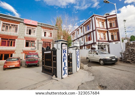 LEH LADAKH , INDIA - AUGUST 11 :The dusty street and new hotels are located in city at Leh Ladakh,India on August 11, 2015.