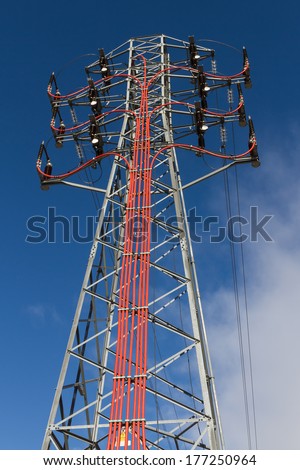 Tower of power lines in the passage of the steering cables underground to aerial