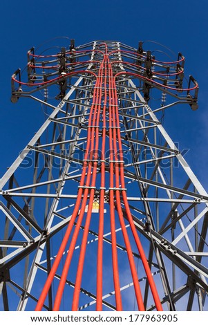 Tower of power lines in the passage of the steering cables underground to aerial