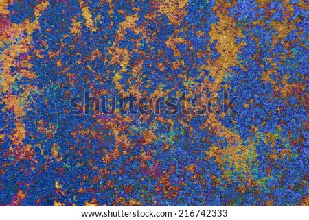 Background texture adobe ocher, blue and maroon colors