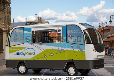 LEON, SPAIN - SEPTEMBER 11, 2014: Prototype tests minibus without drivers for the streets of Leon. The CityMobil 2 is a project of urban automatic road transport system  without fully electric driver