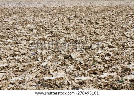 Plot of land or agricultural land recently plowed for farming