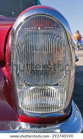 LEON, SPAIN - APRIL 26, 2014: Front view of a car headlight Old Mercedes Benz in the XV Classic Car Rally of Leon. Frosted glass lighthouse brand Bosch