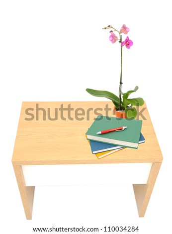 Studying desk with orchid blooms