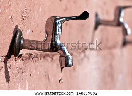 Dripping water from faucet in national park