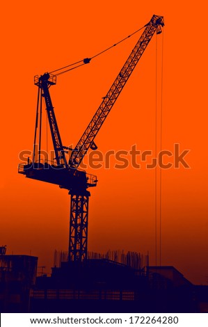 silhouette construction site - industry crane machine project sunset engineering job