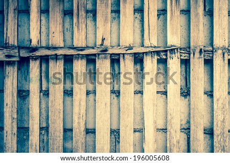 wooden plank over cement wall - texture  cracks cement background ancient stone retro