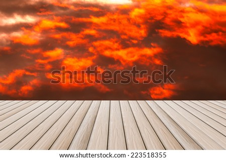wood plank platform with awesome morning sky