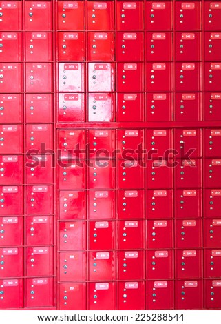 row of red safety box - stainless panel key lock numbers post office mail communication secure
