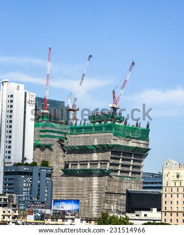 Bangkok, Thailand - November 11, 2014 - Construction of new condominium under blue sky along sky train lines in Bangkok.