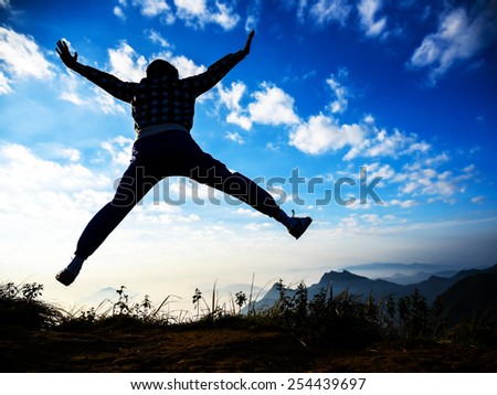 happy celebrating winning success people jumping