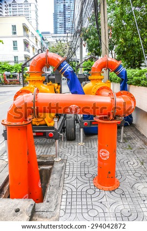 Bangkok Thailand - June 18, 2015 - Water pumping machinery is set up to help preventing the flooding in the city of Bangkok as it is the beginning of the fall season in Thailand.