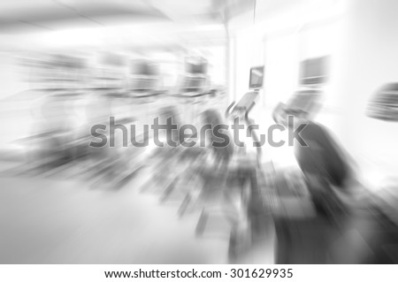 blurred image of black and white gym for background - healthy fitness club clean center