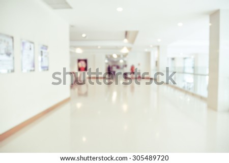 blurred image of modern hospital - corridor hallway