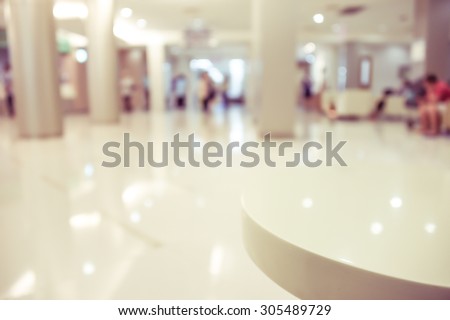 blurred image of modern hospital -patient waiting