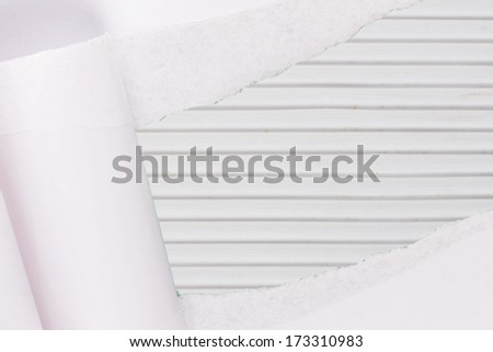 ripped paper on fabric  background