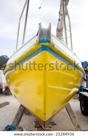 The boat out of water for maintenance.