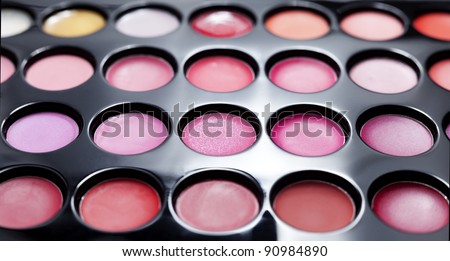 Set of professional colorful lipstick palette in close-up view.