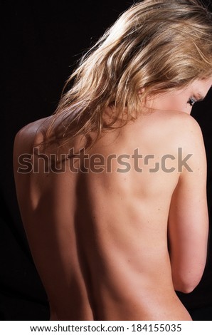 Parts of the body of young caucasian woman on black  background