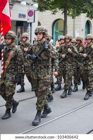 ZURICH - AUGUST 1: Swiss Infantry division taking part in Swiss National Day parade on August 1, 2009 in Zurich, Switzerland.