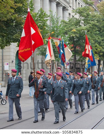 ZURICH - AUGUST 1: Swiss National Day parade on August 1, 2011 in Zurich, Switzerland. Swiss army infantry division taking part in parade.