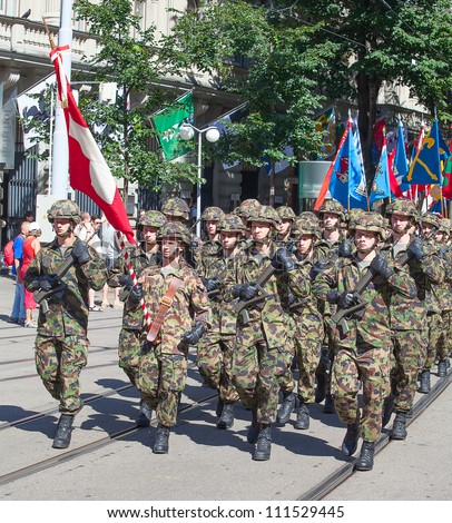ZURICH - AUGUST 1: Infantry division of the Swiss army participating in the Swiss National Day parade on August 1, 2009 in Zurich, Switzerland.