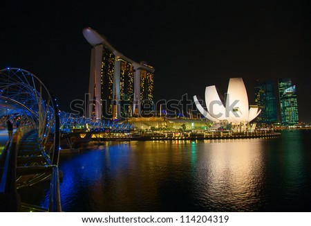 SINGAPORE - FEBRUARY 22: The Marina Bay Sands complex at night on February 22, 2012 in Singapore. Marina Bay Sands is integrated resort billed as the world\'s most expensive standalone casino property.