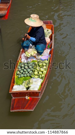 RATCHABURI, THAILAND - FEB 20: A Thai fruits at Damnoen Saduak floating market on February 20, 2011 in Ratchaburi, Thailand.The local market is popular for traditional style food and old Thai culture.