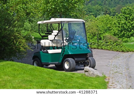 Row of golf carts near the field