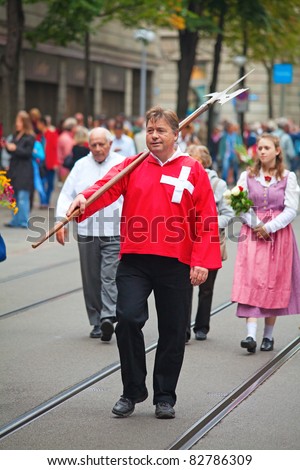 ZURICH - AUGUST 1: Swiss National Day parade on August 1, 2009 in Zurich, Switzerland. Representative of canton Schwyz in the national costumes.