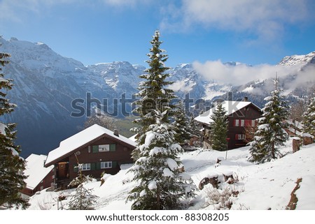 Winter holiday houses in swiss alps