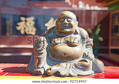 Ancient chinese laughing buddha statue