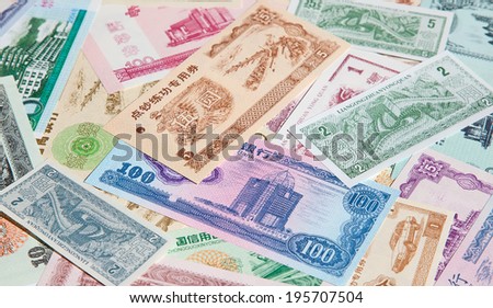 Variety of the chinese food stamps and local banknotes