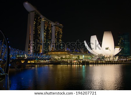 SINGAPORE - FEBRUARY 22: The Marina Bay Sands complex at night on February 22, 2012 in Singapore. Marina Bay Sands is an integrated resort and billed as the world\'s most expensive standalone casino.