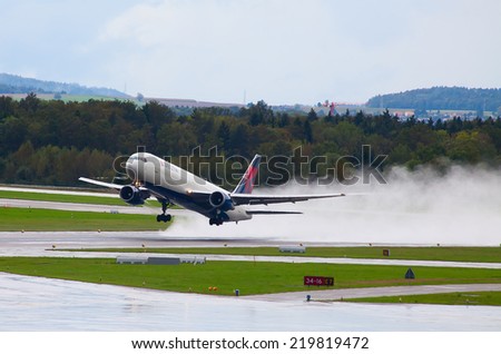 ZURICH - SEPTEMBER 21: Boeing 757 Delta airlines taking off on September 21, 2014 in Zurich, Switzerland. Zurich International Airport is one of the major Europian Hub and home port of Swiss airline.