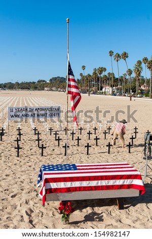 SANTA BARBARA, CALIFORNIA, USA, OCTOBER 07: Anti-war protest on Santa Barbara beach on October 07, 2012. Over 4000 crosses representing americans killed in Afghanistan and Iraq.
