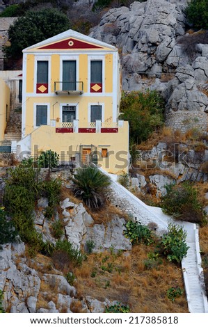 a villa on the top of a hill in \'Symi, Greece