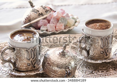 Turkish coffee with delight and traditional silver serving set