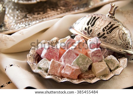 Turkish delight with coffee and traditional silver serving set