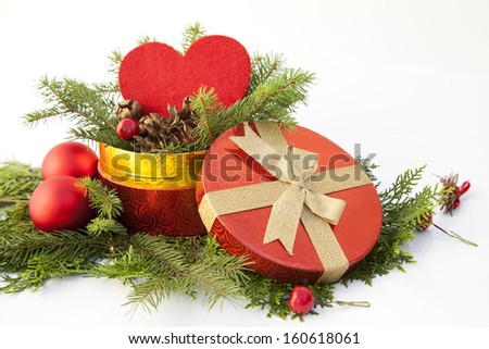 christmas red gift box with gold ribbon isolated on white