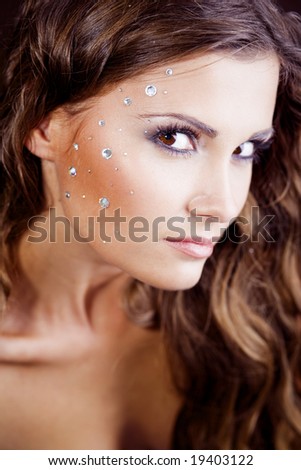stock photo Beautiful face with fashion makeup Shallow DOF focus on eye
