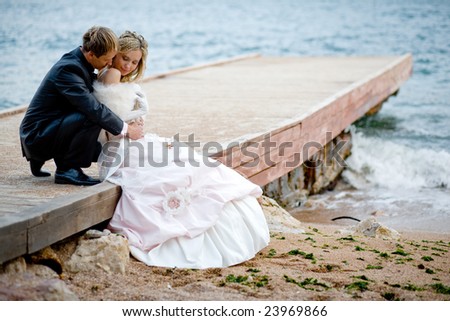 stock photo Romantic wedding couple at beach