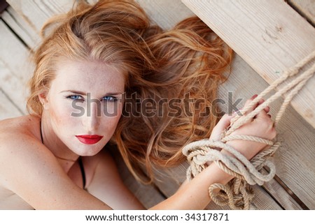 stock photo Portrait of tied up beautiful girl