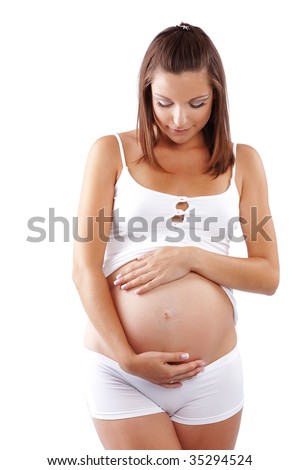 stock photo Beautiful young pregnant mother isolated on white