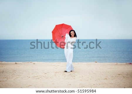 Young girl resting at beach near the sea
